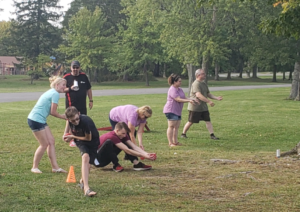 Encorus employees and their families gave their best effort in the water balloon toss